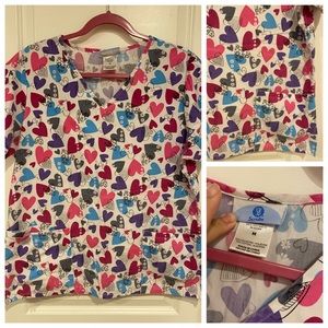 M Scrub top, good condition. No stains. Smoke free home.